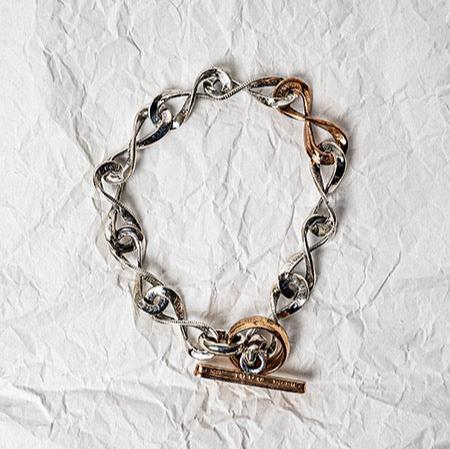 North Works Twisted Silver & Copper Coin Bracelet close-up