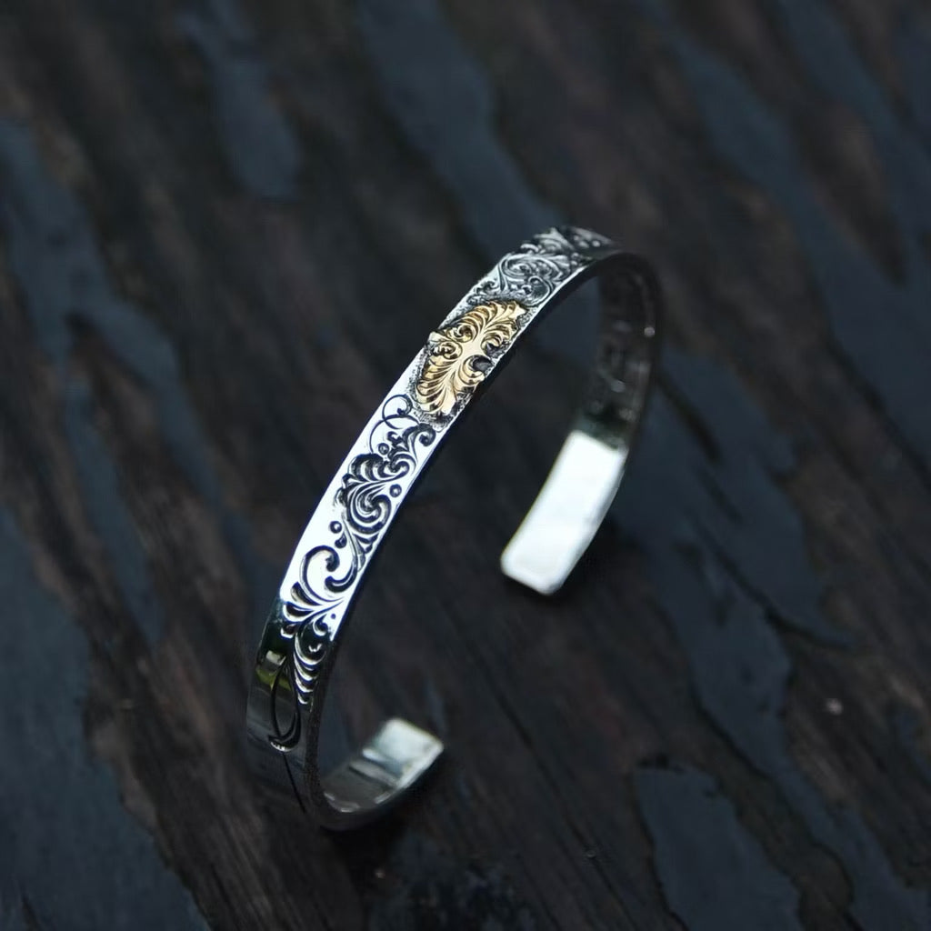 Jinny’s 18k Eagle Arabesque Bangle
