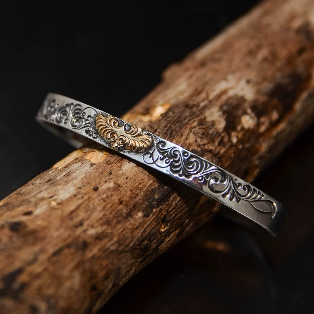 Jinny’s 18k Eagle Arabesque Bangle