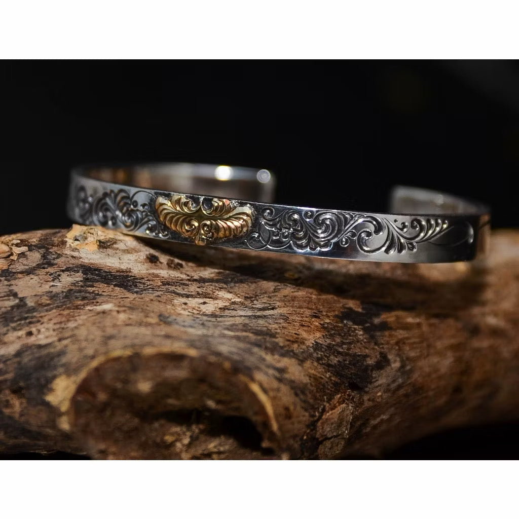 Jinny’s 18k Eagle Arabesque Bangle